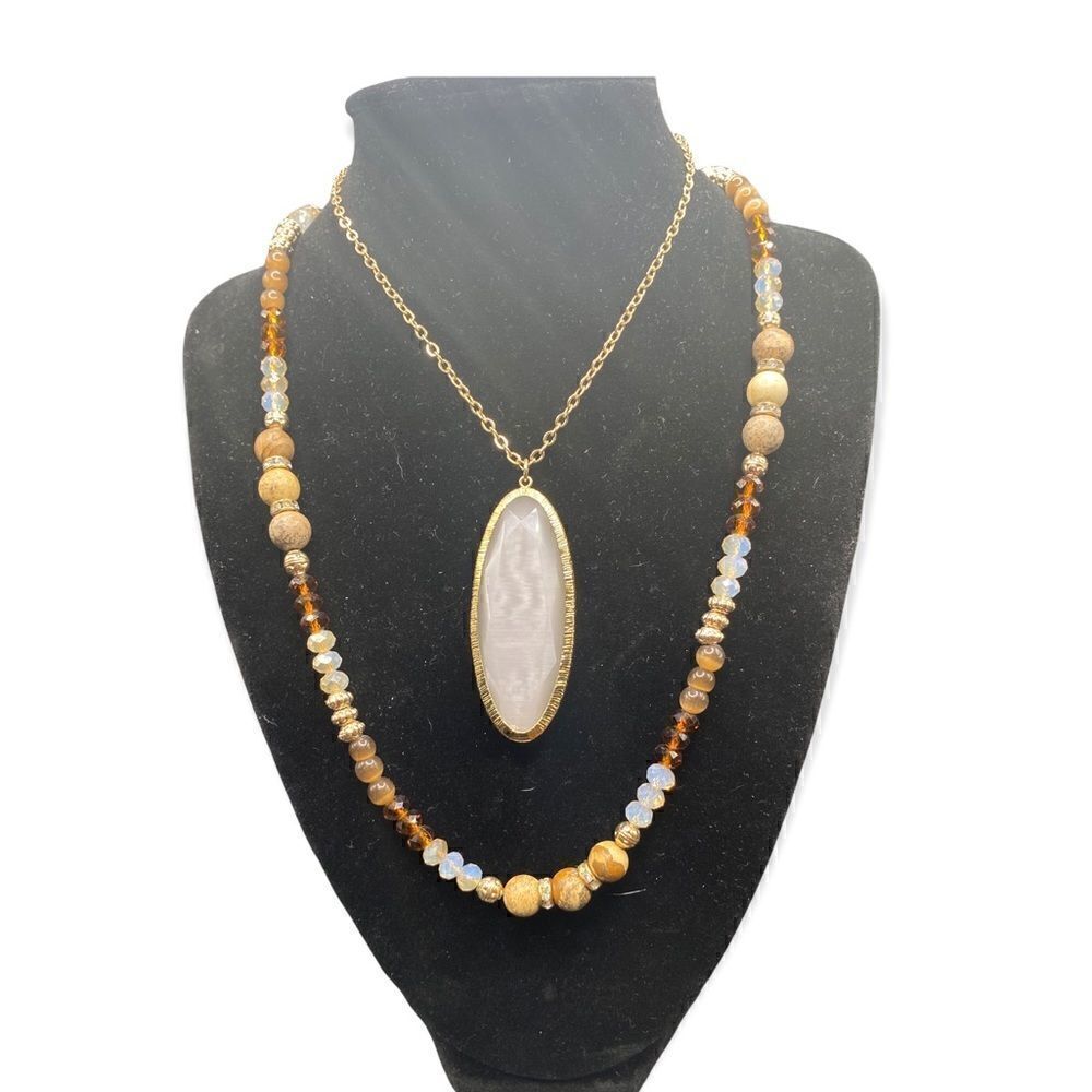 Two necklaces one with cream stone pendant other crystal beads adjustable slide